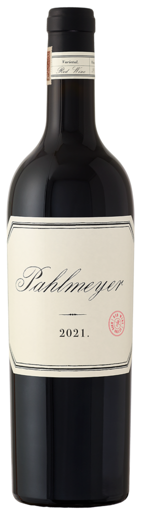 A bottle of Pahlmeyer 2021 red wine with a white label and embossed logo.